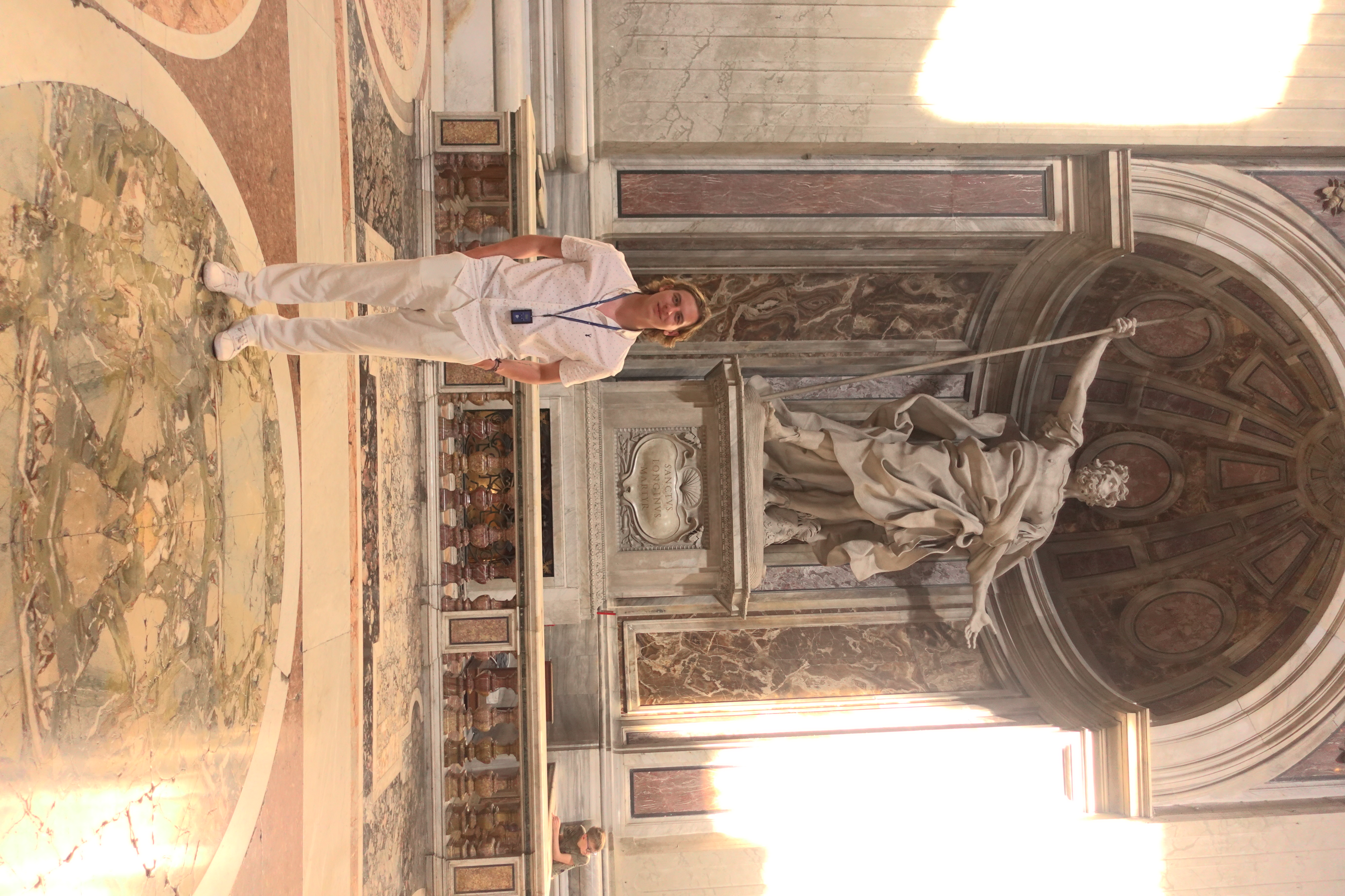 Kacper Bartosiewicz standing inside a historic building